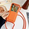 Silikónové puzdro pre iPhone 17 Pro / 18 Pro s držiakom na karty a nastaviteľným popruhom na rameno – oranžové thumbnail
