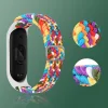 Xiaomi Mi Band 6 / 5 / 4 / 3 Fabric szövet óraszíj piros / fehér thumbnail