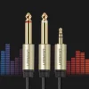 Ugreen kábel audio kábel mini jack 3.5 mm - 2 x jack 6.35 mm 1m szürke (AV126) thumbnail